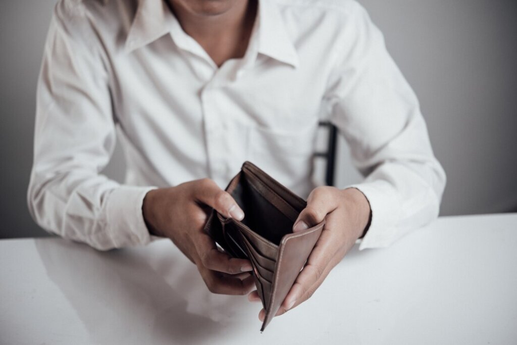 man with an empty wallet