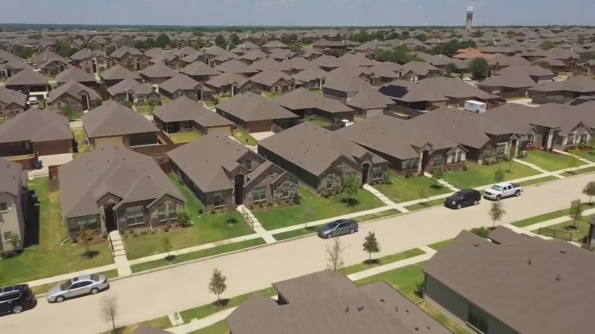 Aerial view of Frisco TX real estate, featuring neighborhoods and new developments.