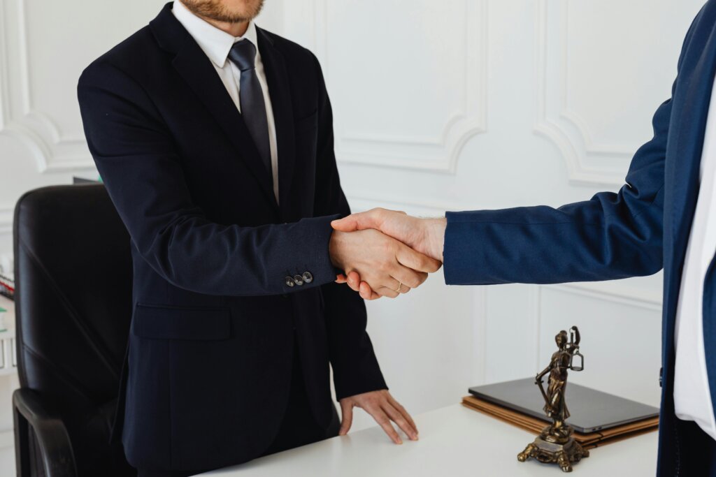 two men shaking hands