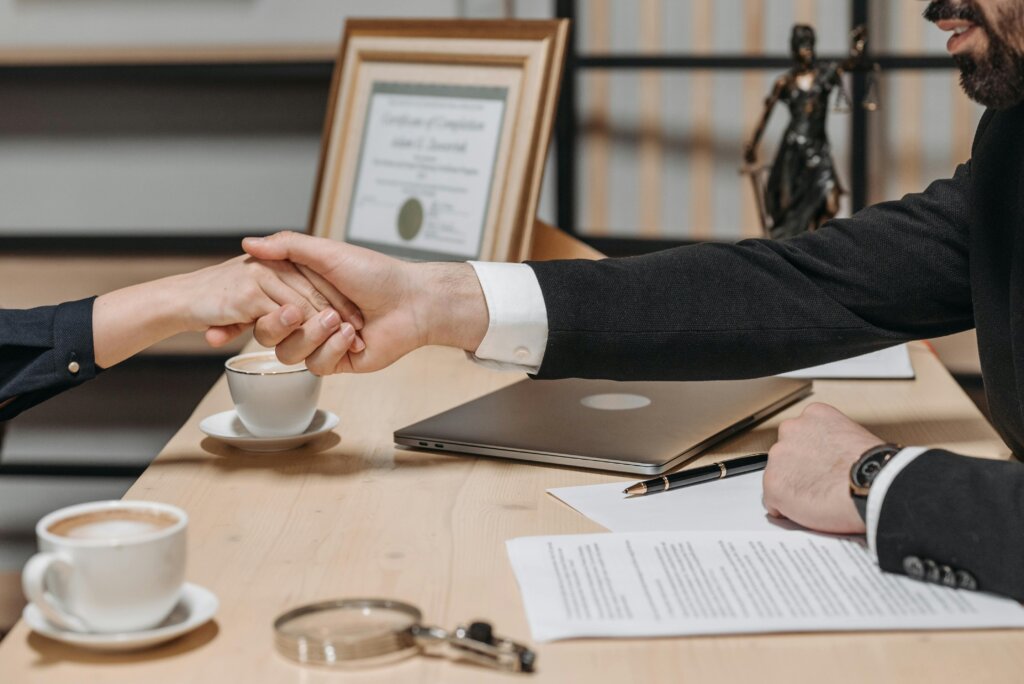 persons shaking hands
