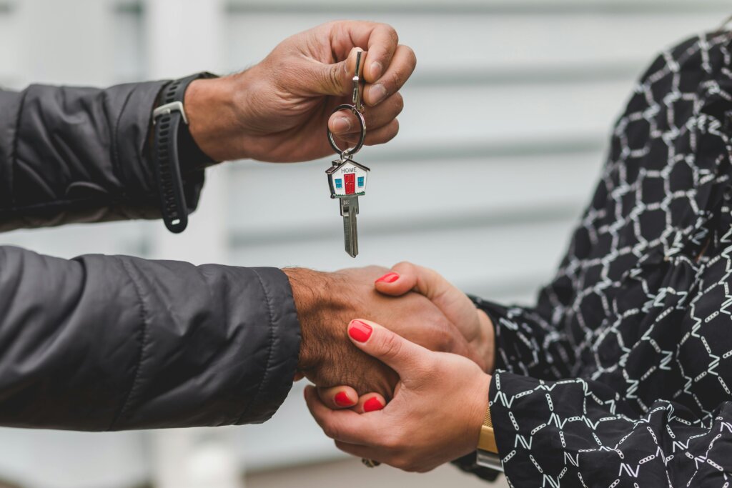 person holding key