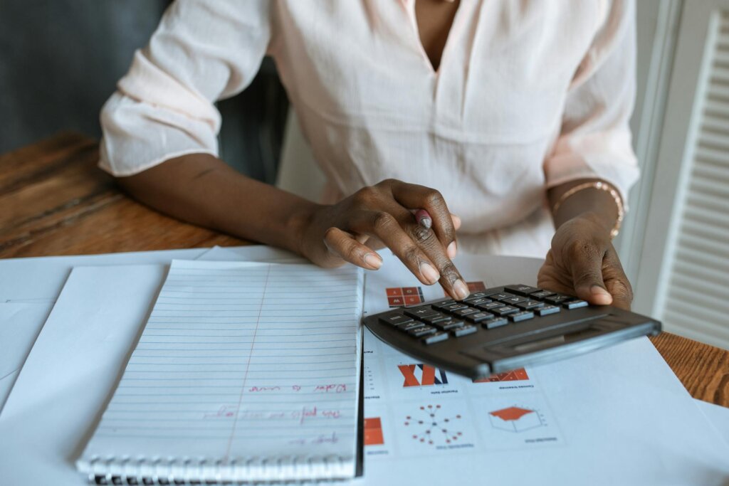 a woman calculating taxes