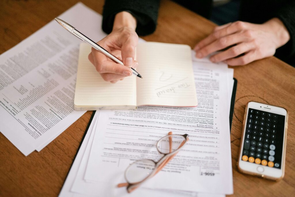 a woman calculating taxes