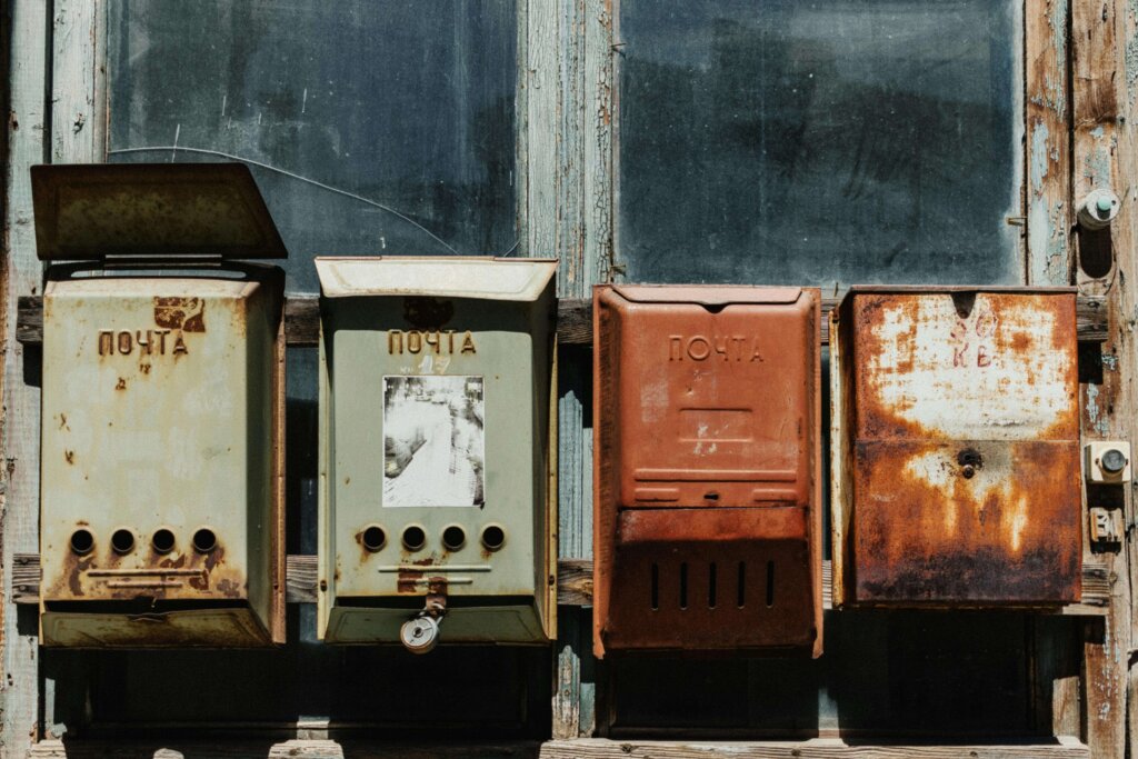 old and rusty mail boxes