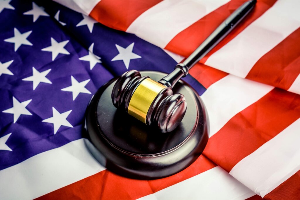 a black gavel on the flag