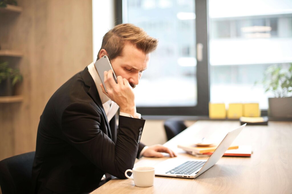 a man using his cell phone