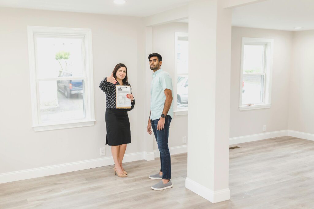 a real estate agent showing a house