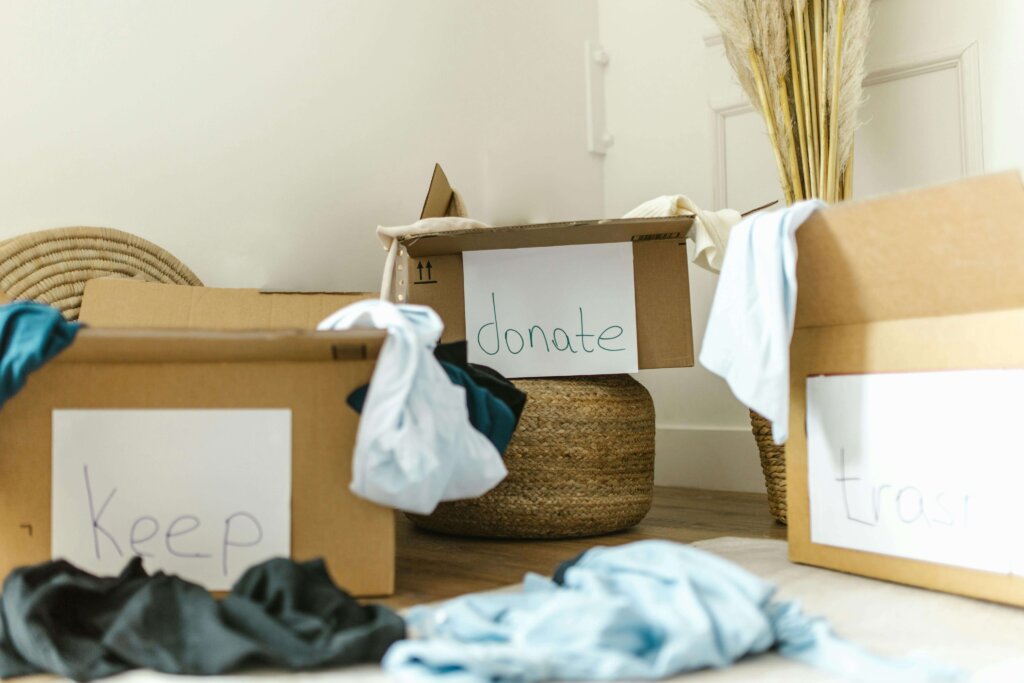 boxes with clothes on the floor