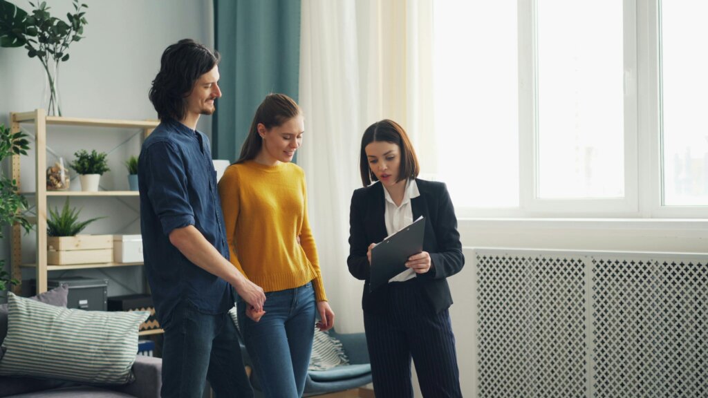 couple with real estate agent