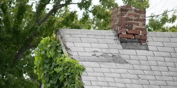 a close up image of a roof that is in bad shape