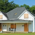 house and green land