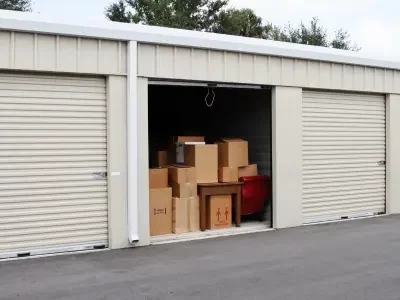 an open storage unit with boxes inside