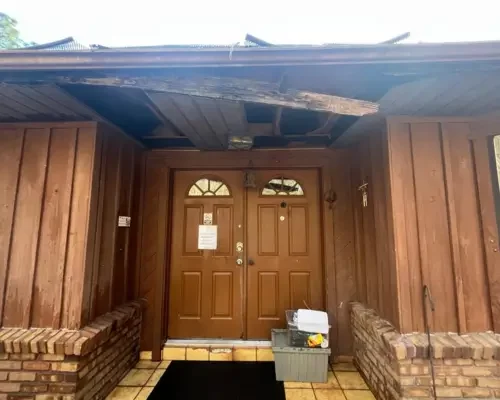 Damaged front-door roof