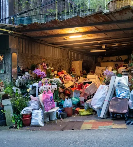 Piles of garbage inside a garage