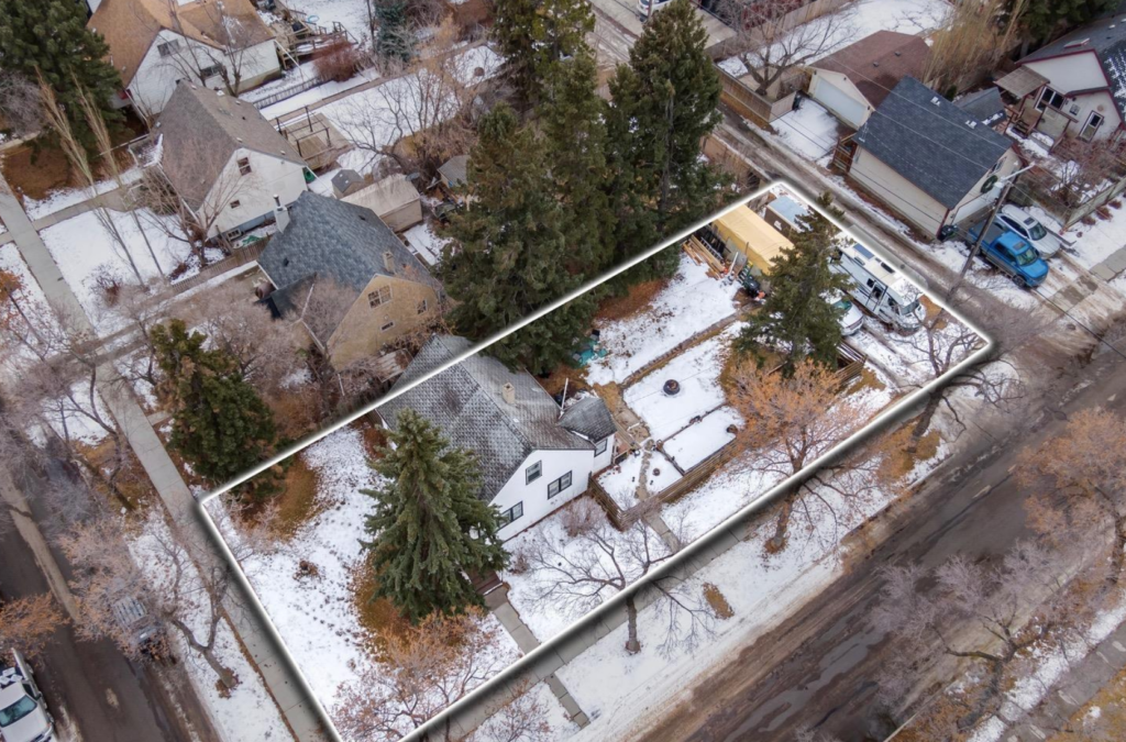 House on land (corner lot) that sold to an Edmonton land developer