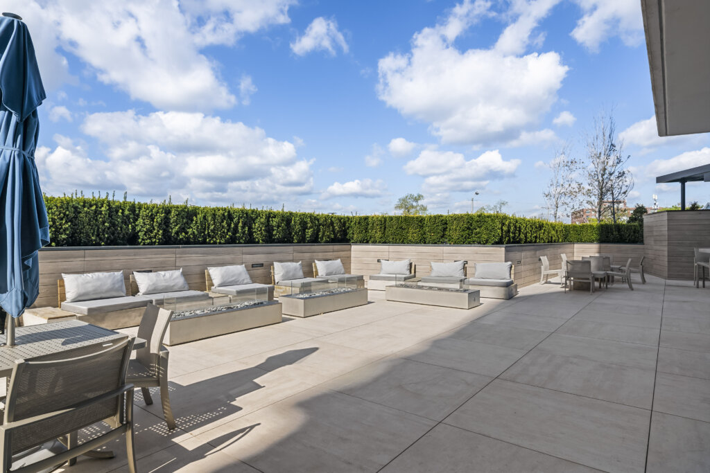 Outdor lounge space with fire pits at South Beach in Long Branch, NJ