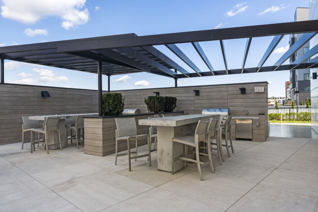 Community grills and patio space at South Beach in Long Branch, NJ