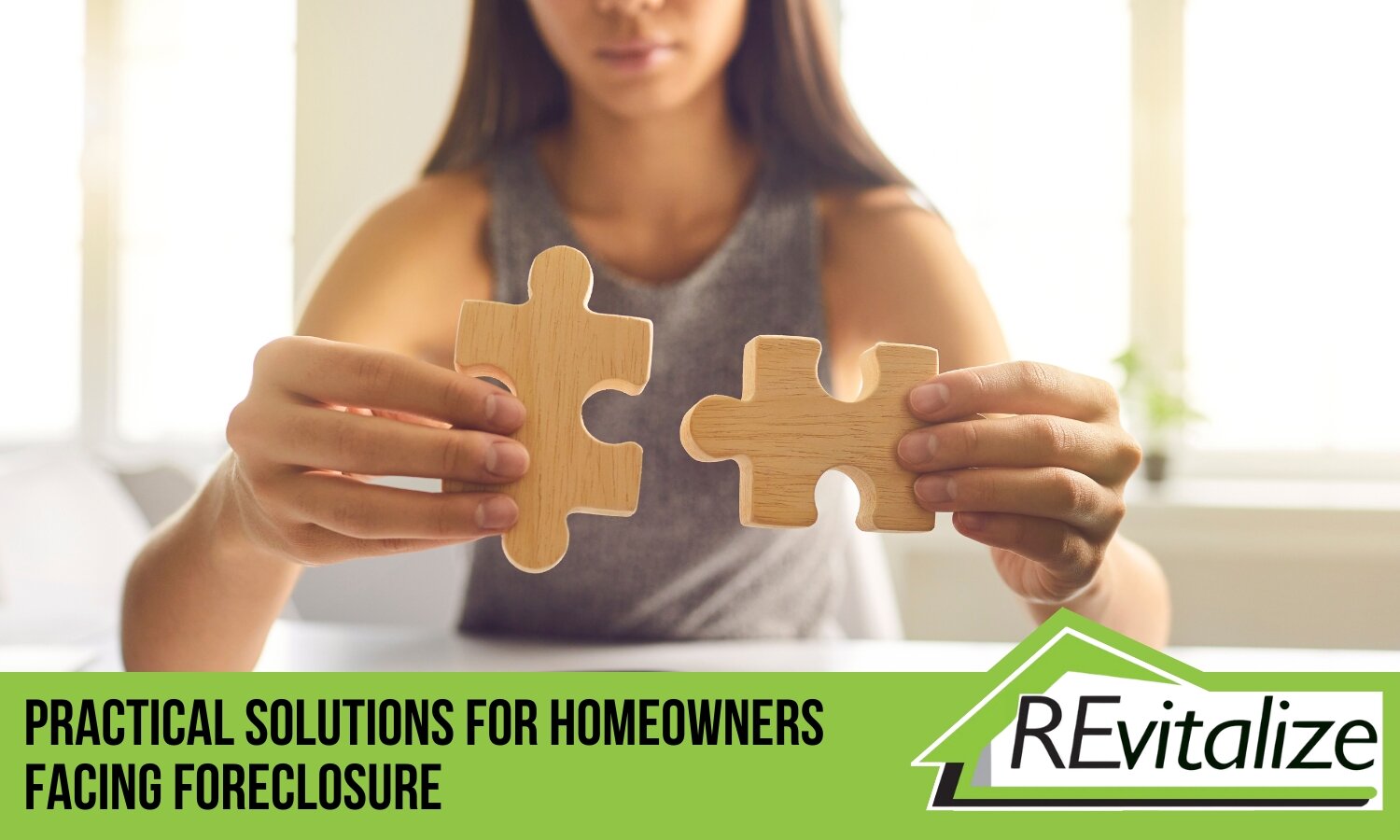 A woman holding two puzzle pieces, symbolizing practical solutions for homeowners facing foreclosure, with REvitalize Property Solutions.