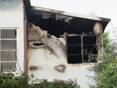 Repair Fire Damage or Sell the Burned House?