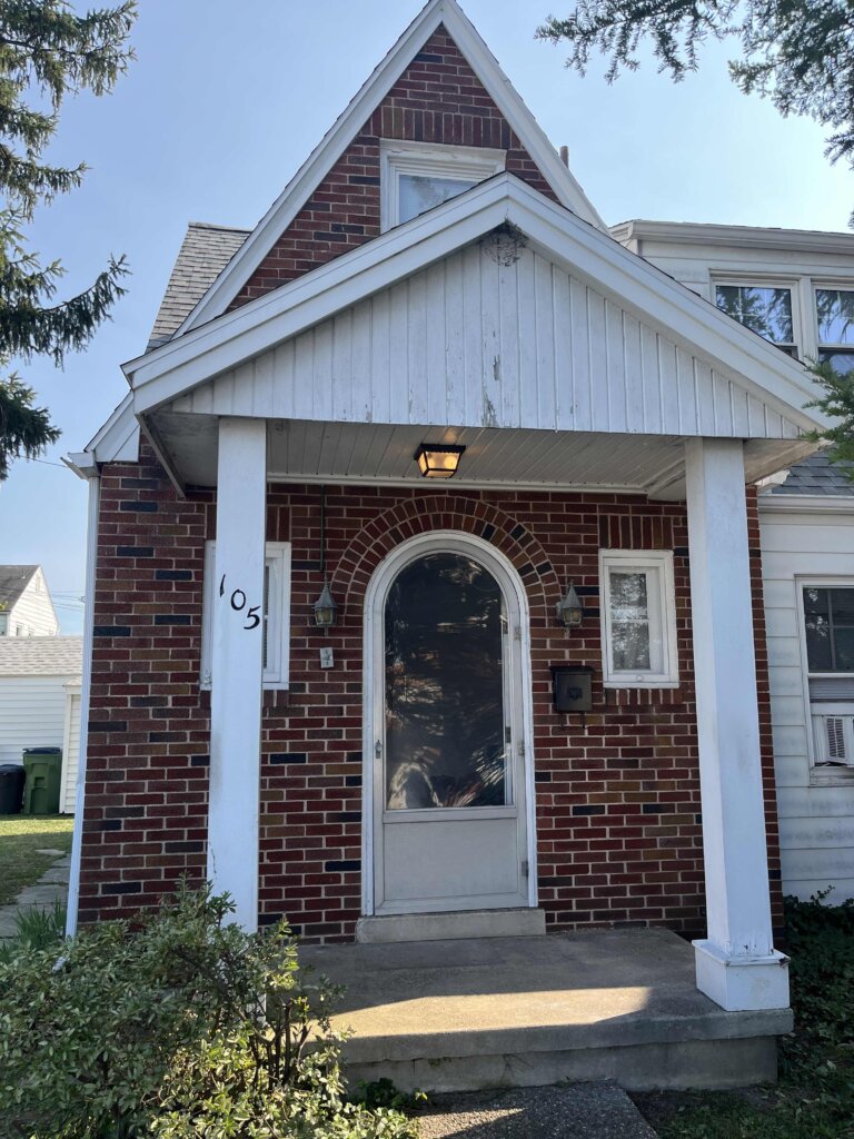 Outside of a home we bought with cash.