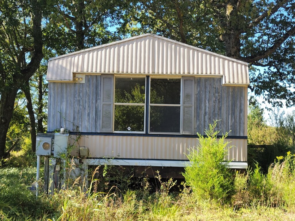 Single WIde Mobile Home that must be moved purchased by Velocity Mobile Home Buyers.