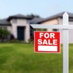 “For Sale” sign in front of a residential home illustrating how to sell your home fast in Sacramento