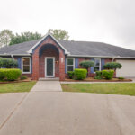 Exterior of a home purchased by Yellowhammer Home Buyers at 108 Crown Oak Ln in Huntsville, Alabama