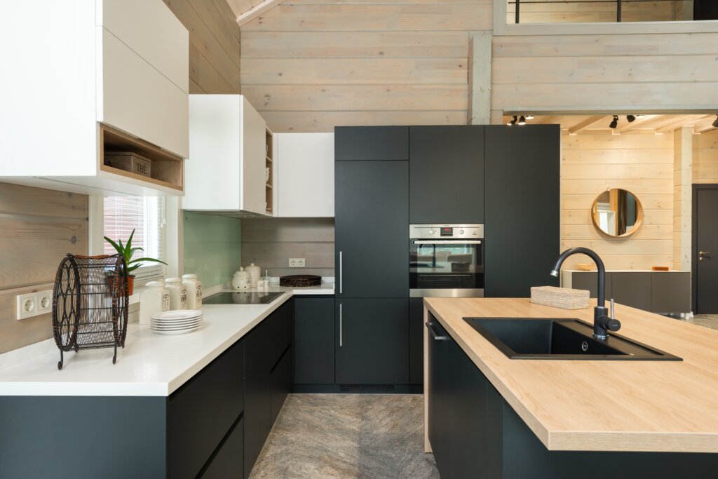 A completely remodeled kitchen that looks clean and modern.