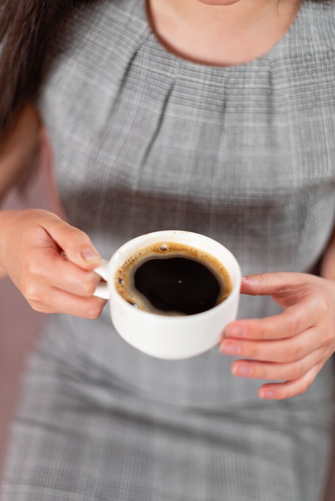A client sitting back with a cup of coffee.