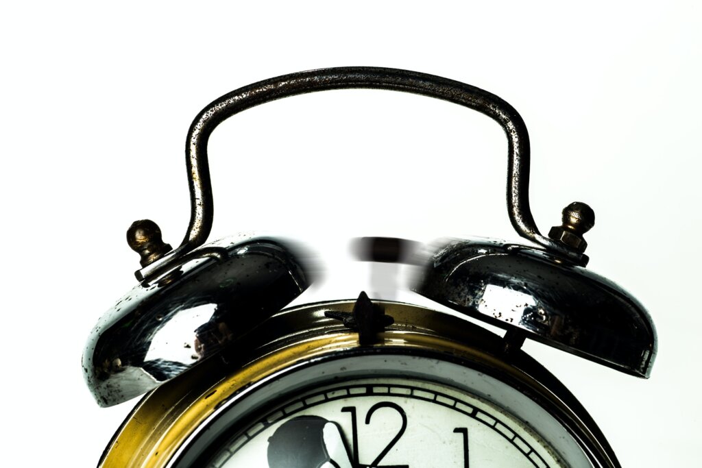 A ringing alarm clock