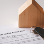 residential lease agreement document with the apartment keys