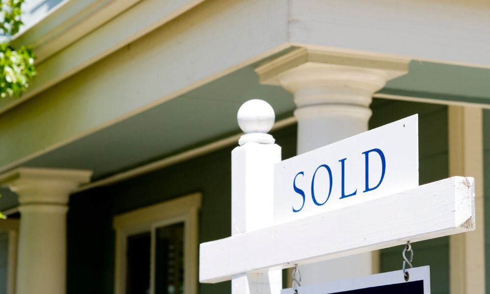 White sold sign