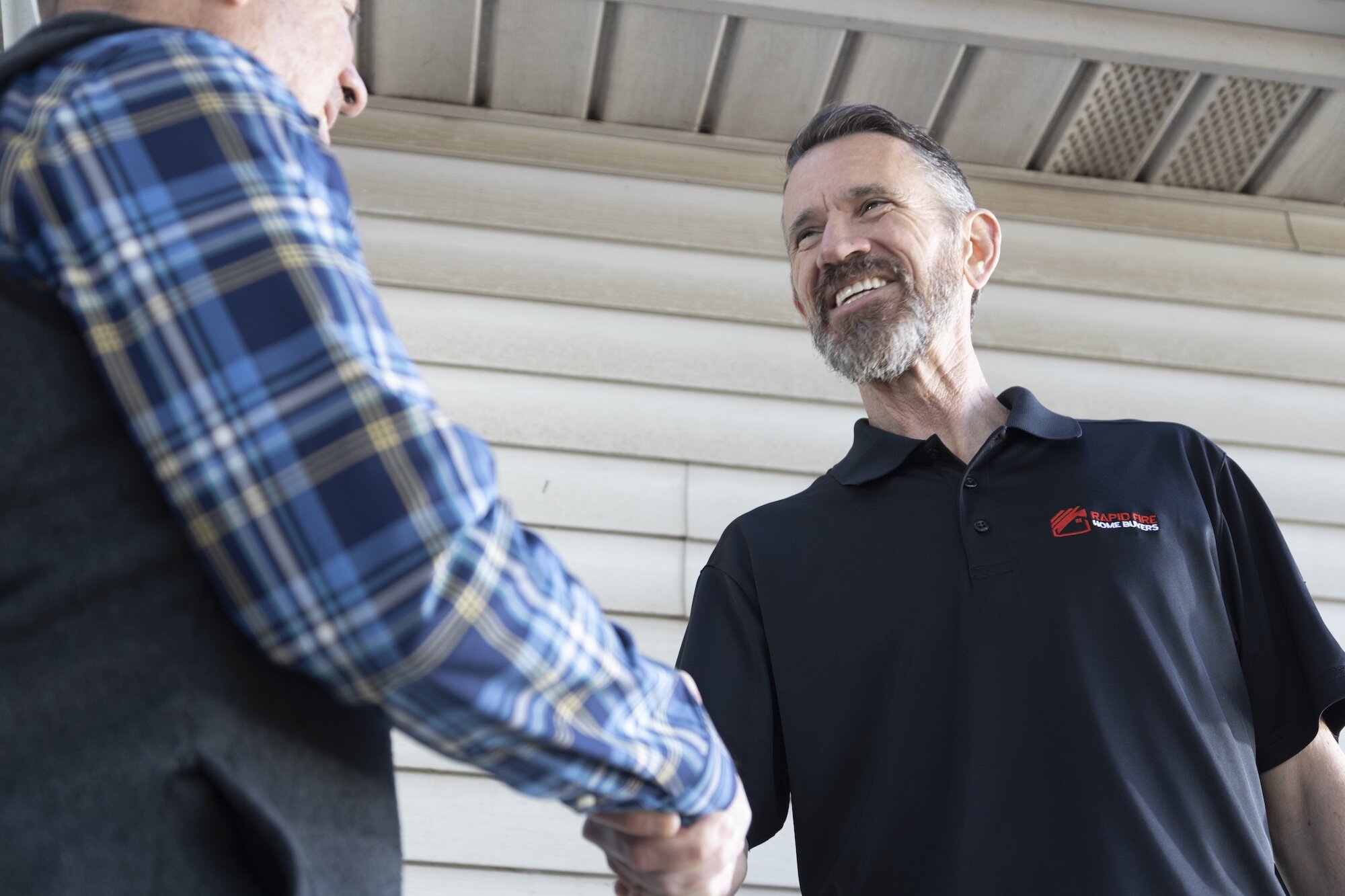 Rapid Fire Home Buyers meeting a customer who wants to sell their house fast.