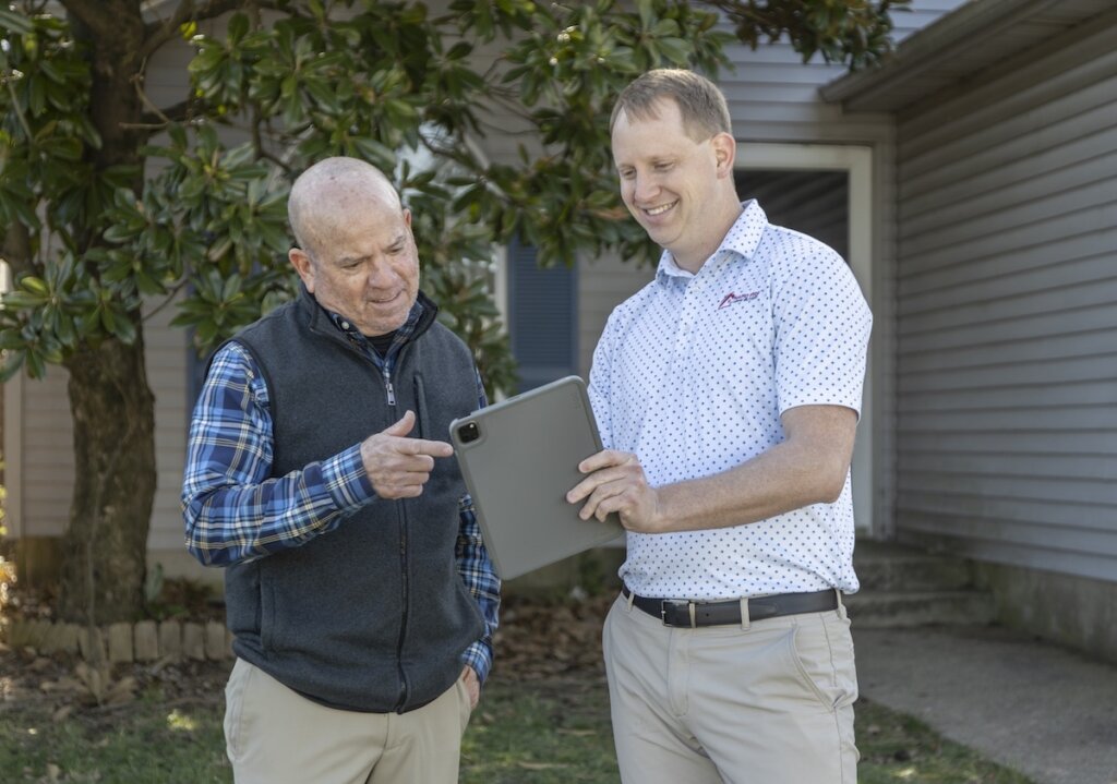 homeowner looking at a cash offer to buy my house quickly with Rapid Fire Home Buyers