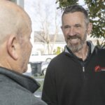Rapid Fire Home Buyers' employee helping a homeowner sell my house fast.