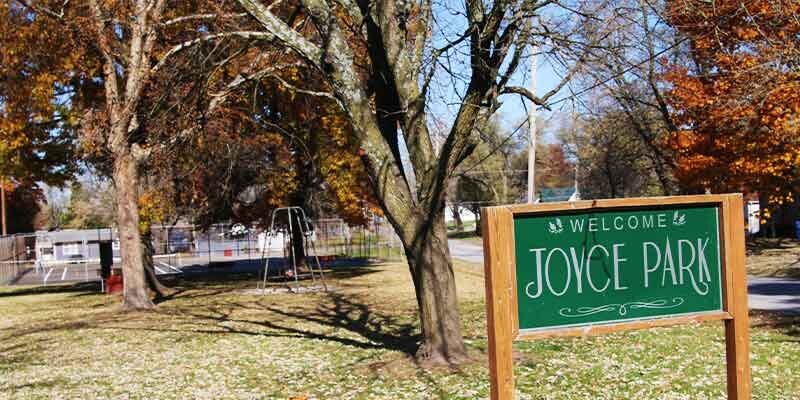 Welcome sign and trees at Joyce Park in Brookfield