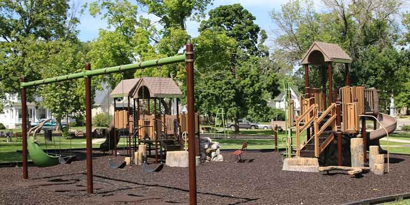 Playground equipment and trees at Twin Parks in Brookfield