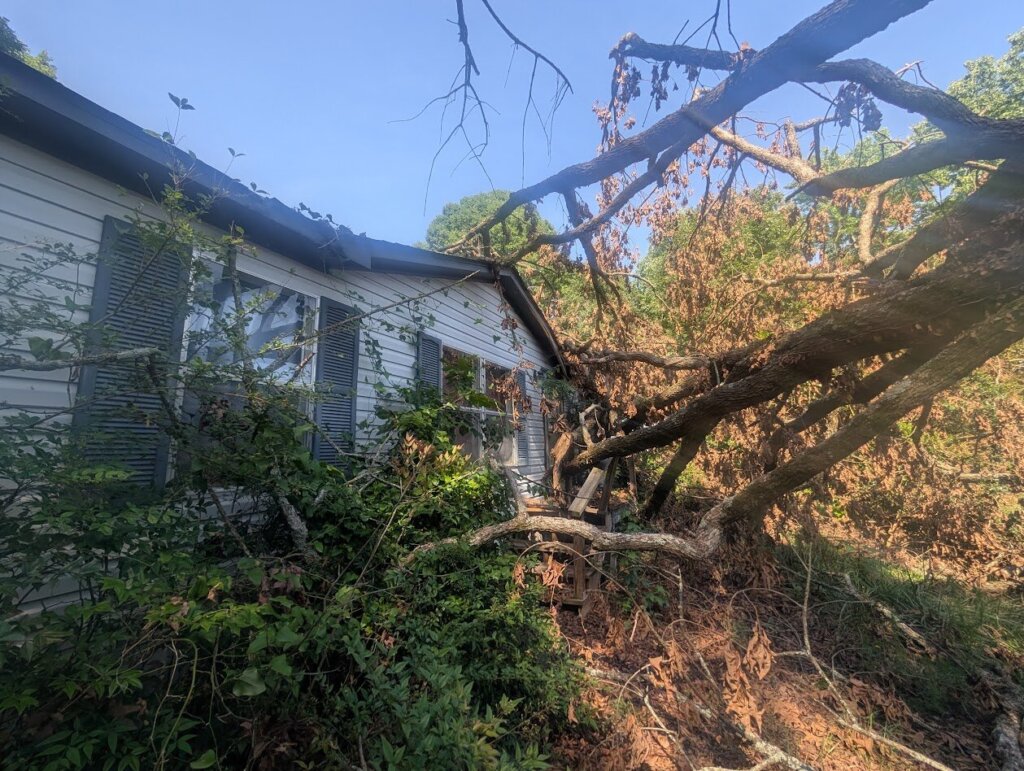 A mobile home Local Key House Buyers purchased in Commerce, GA within Madison County Georgia - this house had a tree fall on it and was an inherited property.