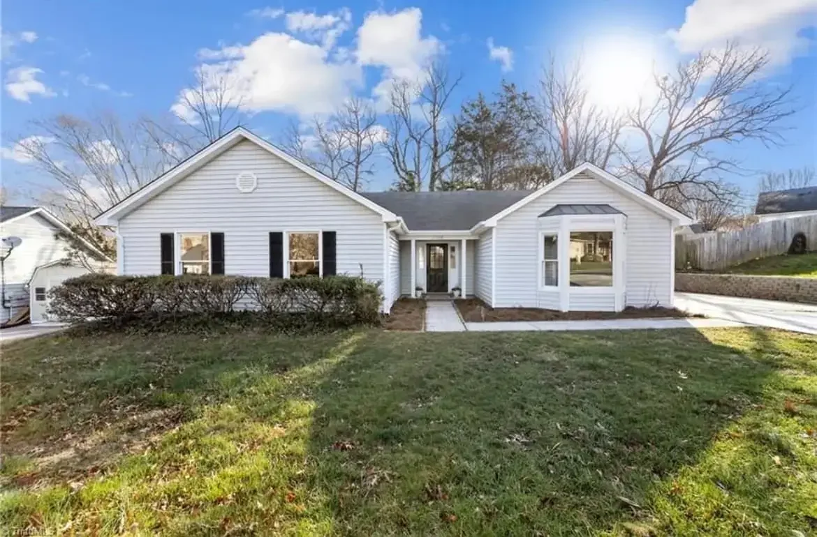 Well-maintained home with updated exterior, representing a property after being purchased and improved by a cash homebuyer.