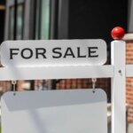 A photo of a sign that you would use when selling your property.