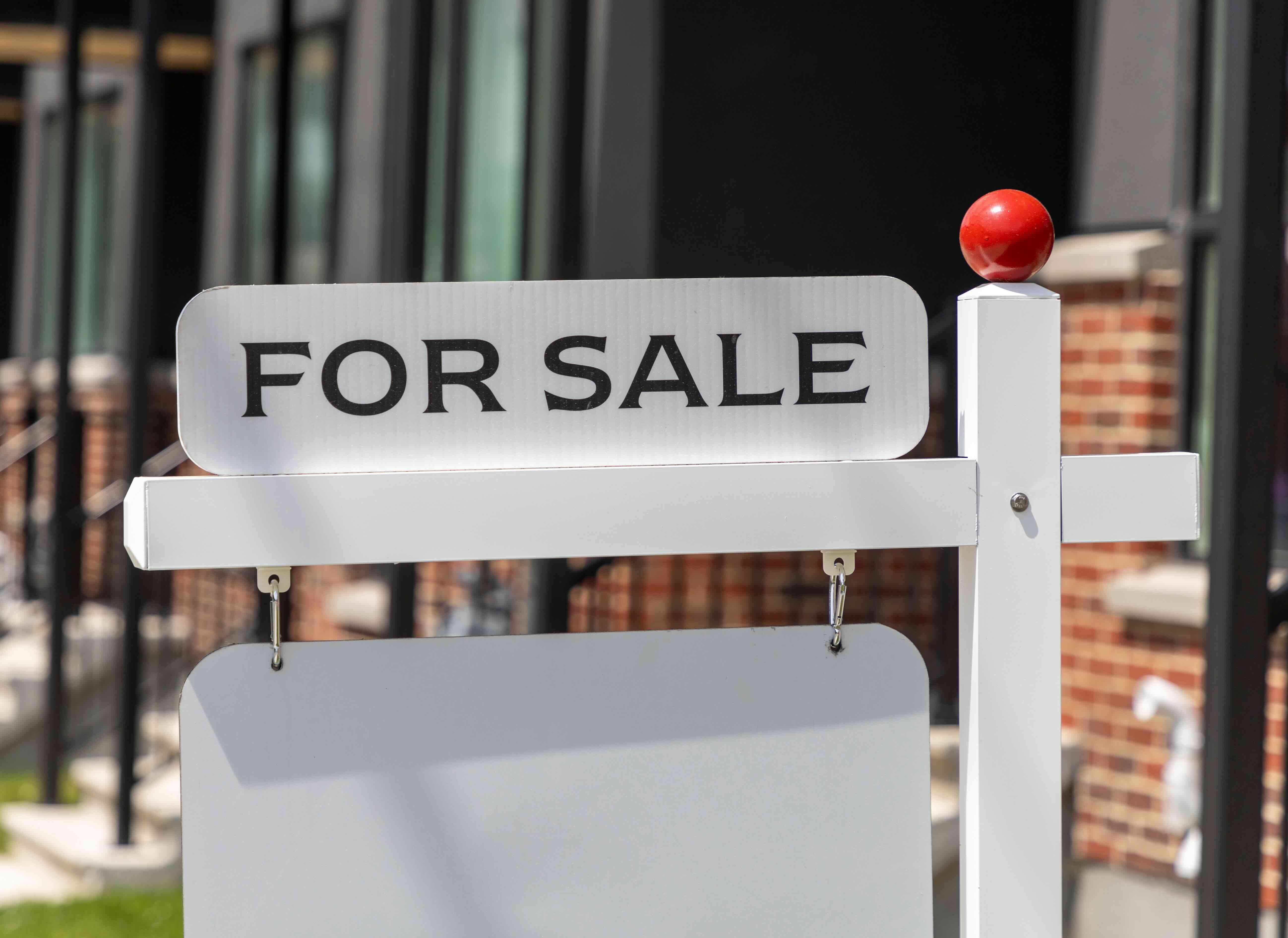 A photo of a sign that you would use when selling your property.