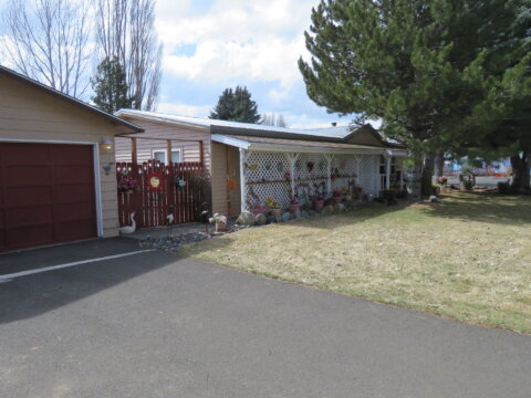 view of Ravenwood house and garge from the front