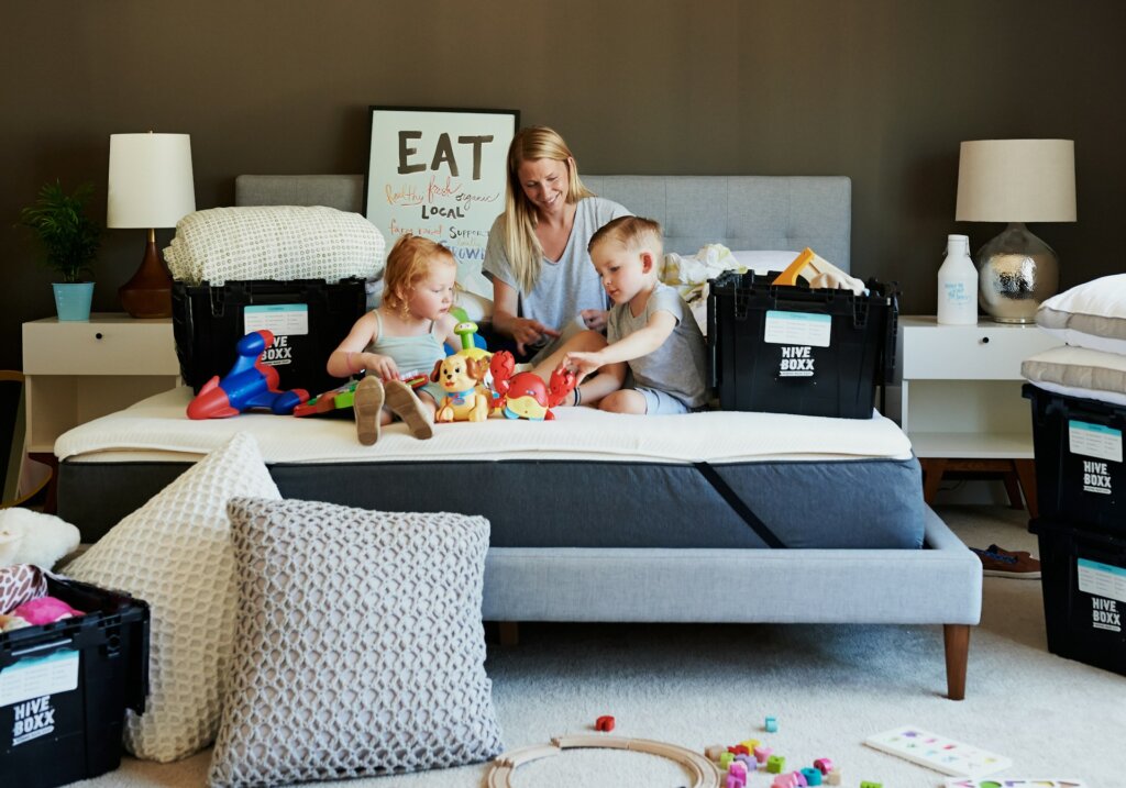 Kids and their mom preparing for a move together