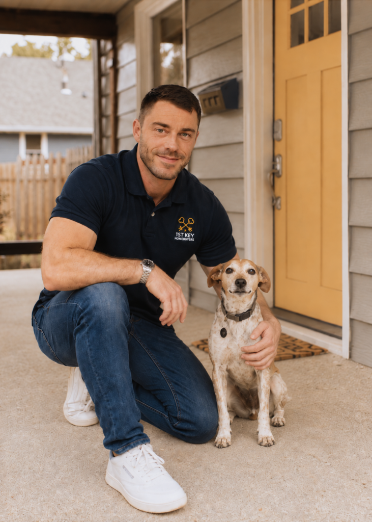Kansas City home buyer with his dog outside a local home