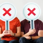 Man and woman with X as faces