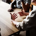 A group of men having a conversation