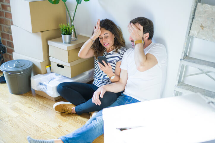 Middle-age-couple-moving-to-a-new-home-stressed-list-your-house-newberg-mcminnville-dundee-bridgetown-home-buyers