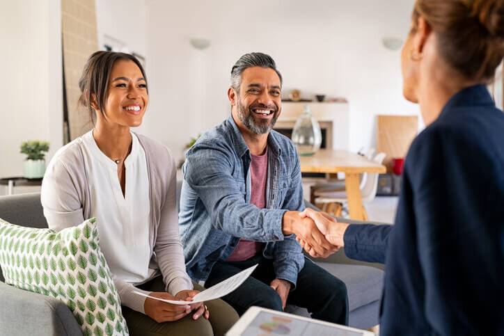 Multiethnic-couple-handshake-with-consultant-home-selling-process-tigard-beaverton-hillsbor-bridgetown-home-buyers