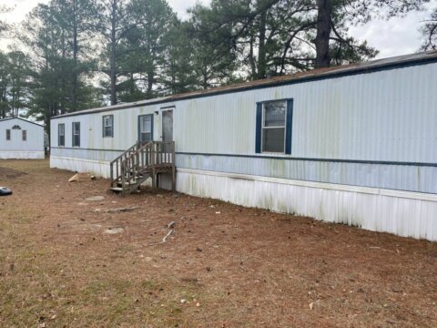 Outside of doublewide mobile home for sale