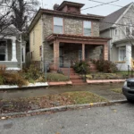 Before: Front exterior of home in Shelby Park, Louisville KY